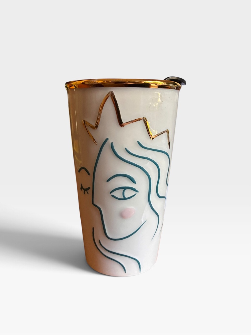 Starbucks White Ceramic Mug with Teal Face Line Art and Gold Rim